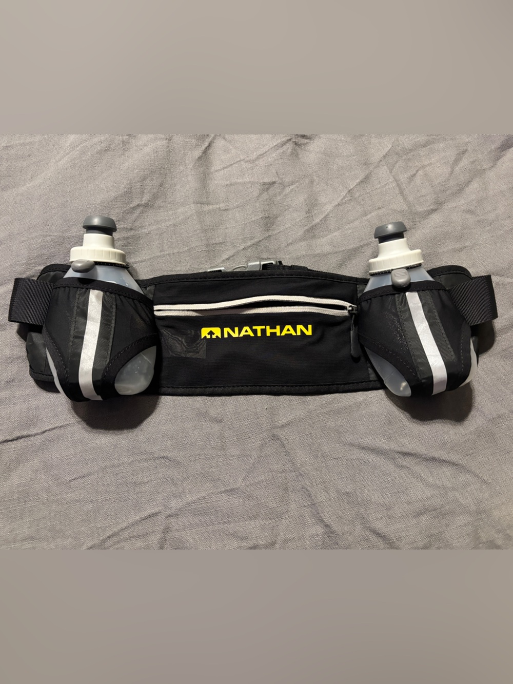 Natan black waist hydration belt with twin bottles and reflective trim